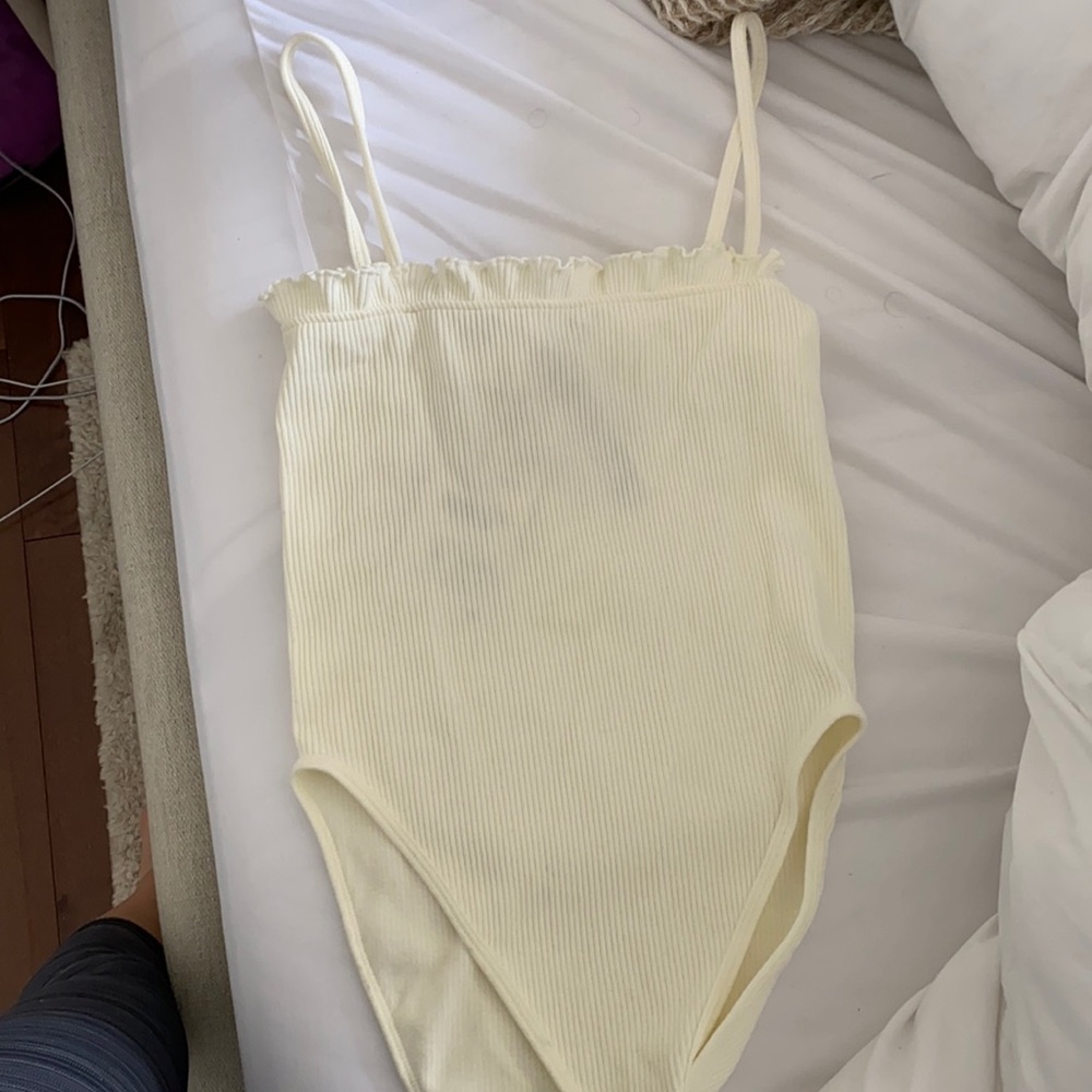 White/cream body suit